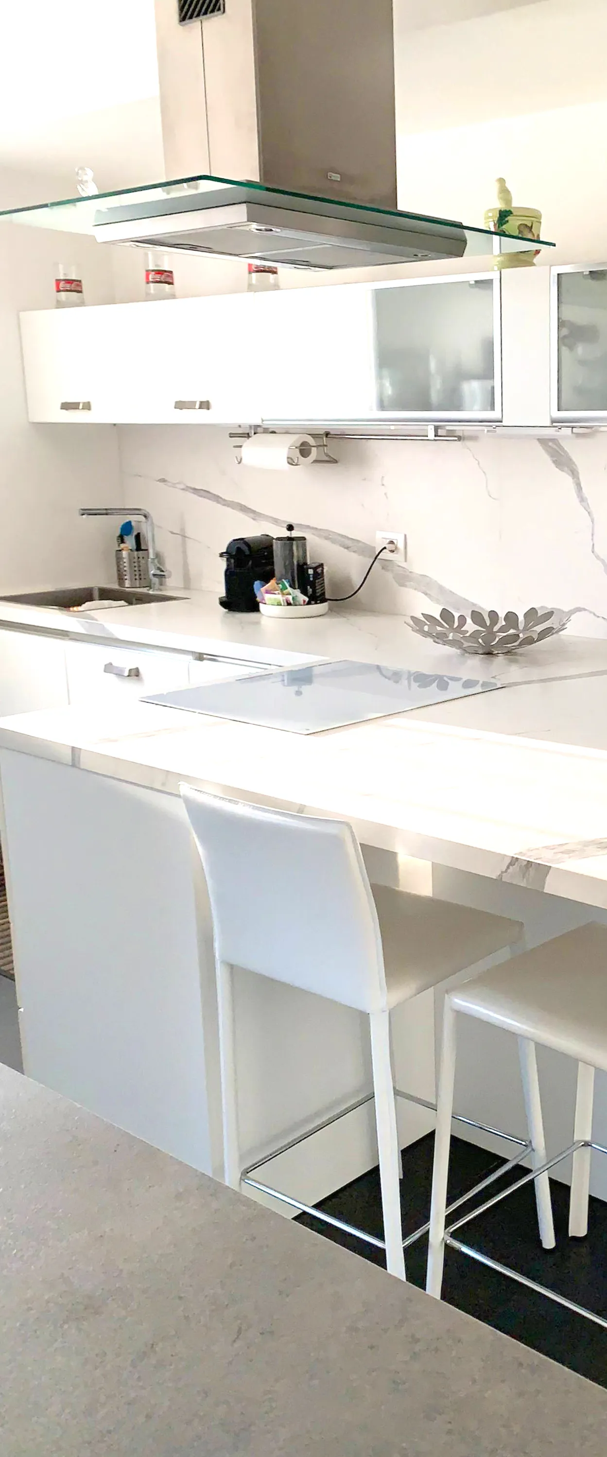 Smart spaces and premium finishes: the kitchen of Suite Verona is designed for those who love to feel at home even away from home.